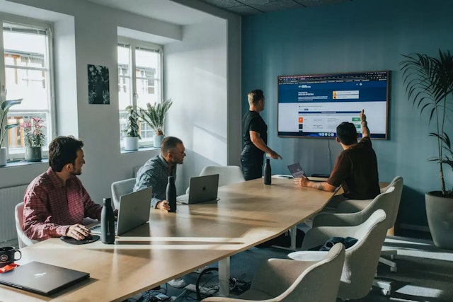 Equipa do Site de Apostas em reuniao